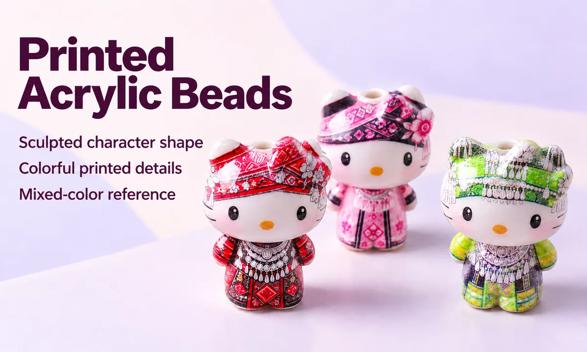 Sculpted cat shape and colorful printed details on acrylic beads