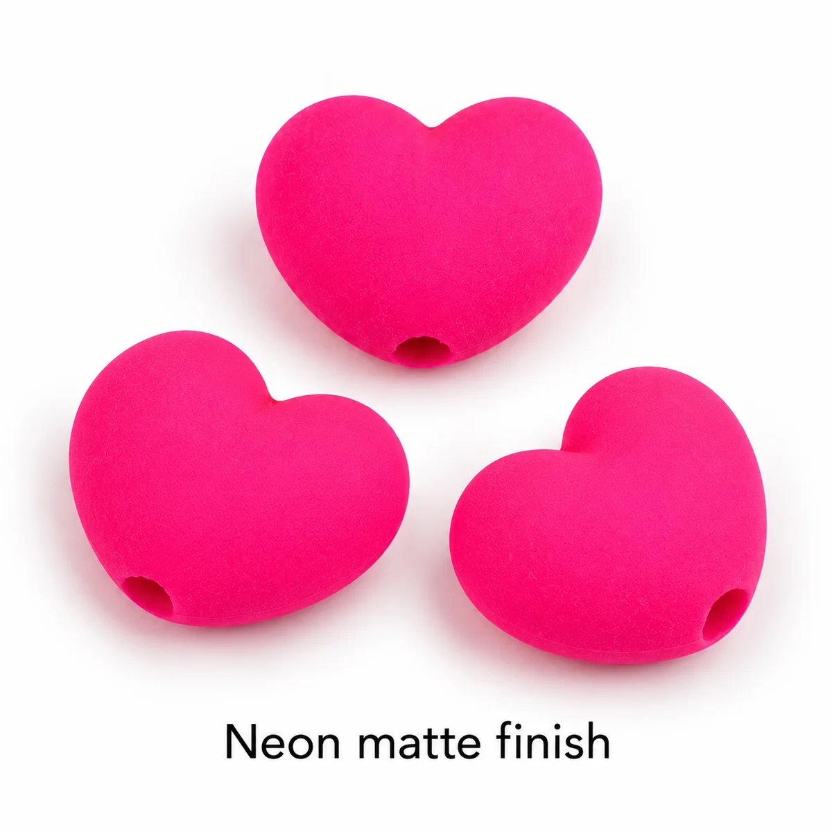 Hot pink acrylic hearts with a neon matte finish