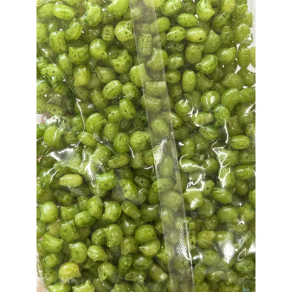 Lime Green Picasso-style glass cat-head beads in the photographed sales bag – 10 × 8 mm
