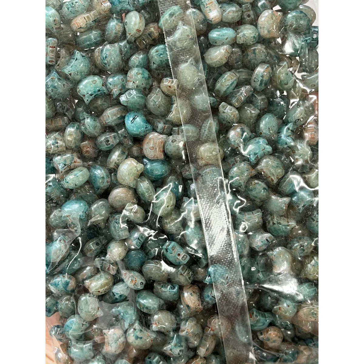Blue & Green Picasso-style glass cat-head beads in the photographed sales bag – 10 × 8 mm