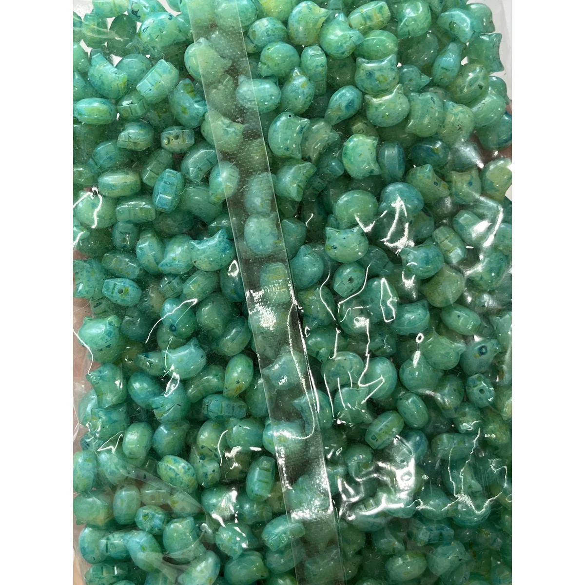 Aqua Picasso-style glass cat-head beads in the photographed sales bag – 10 × 8 mm