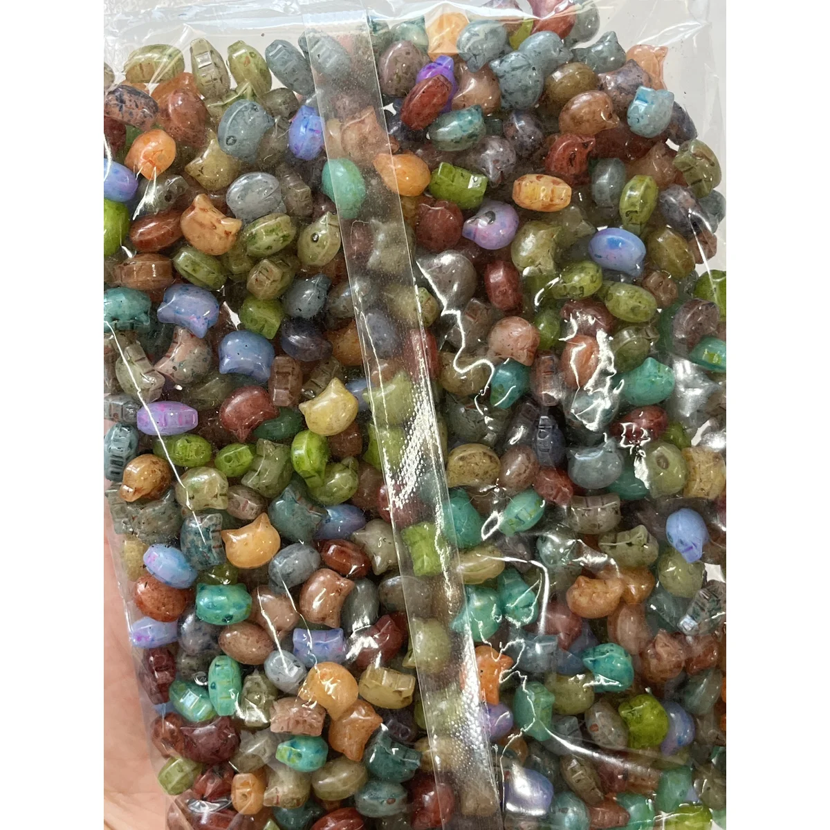 Mixed Colors Picasso-style glass cat-head beads in the photographed sales bag – 10 × 8 mm